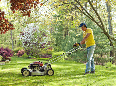 man mowing a lawn